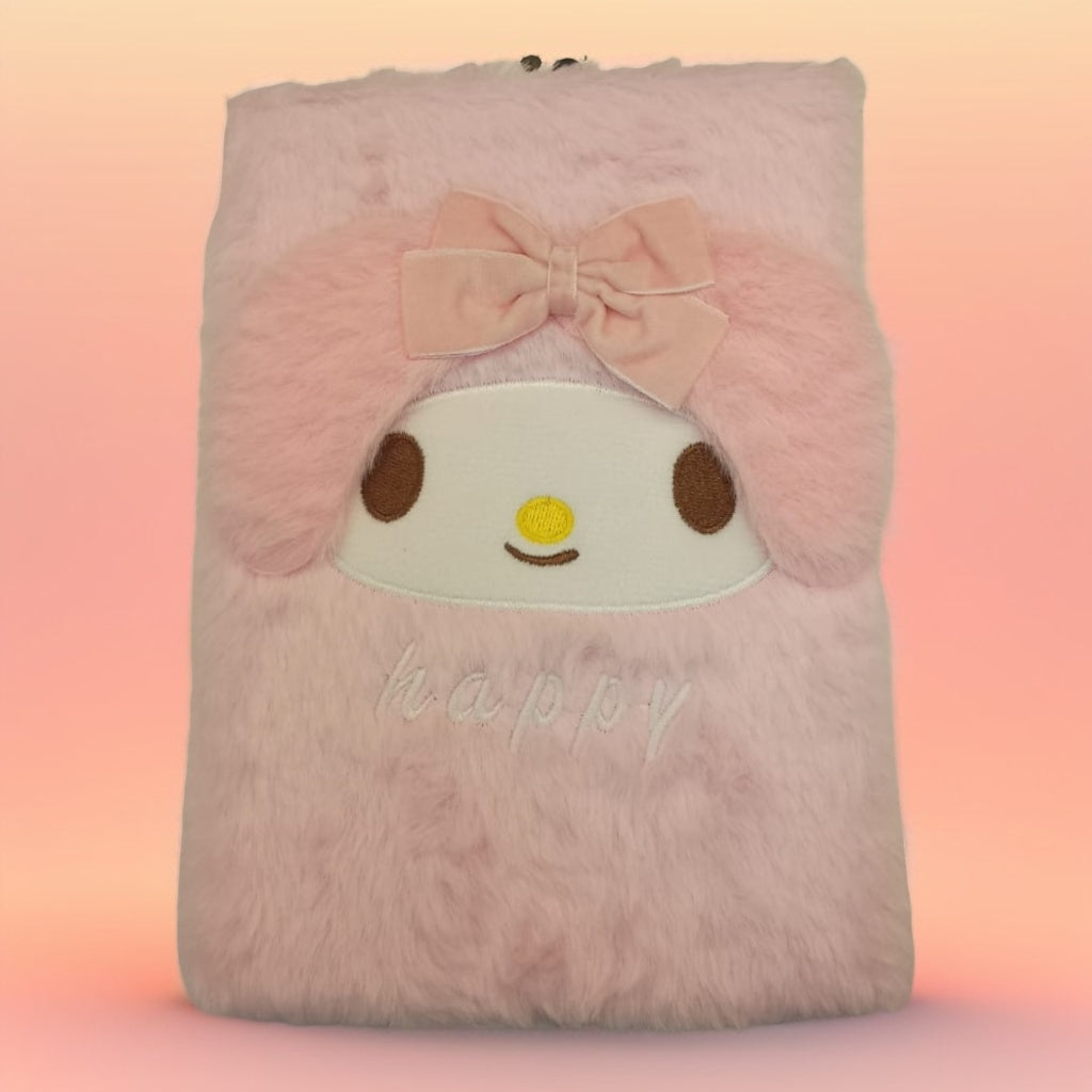 Cuaderno con personajes y peluche