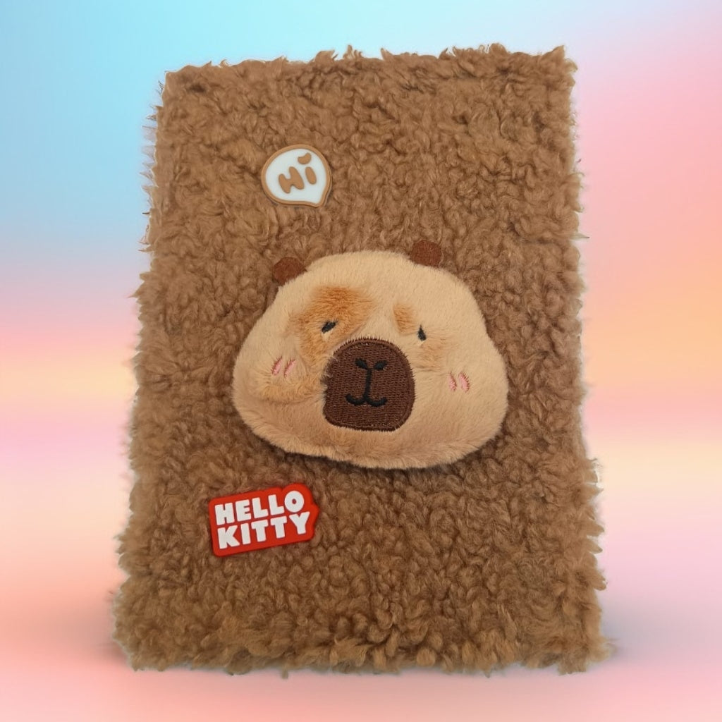 Cuaderno con personajes y peluche