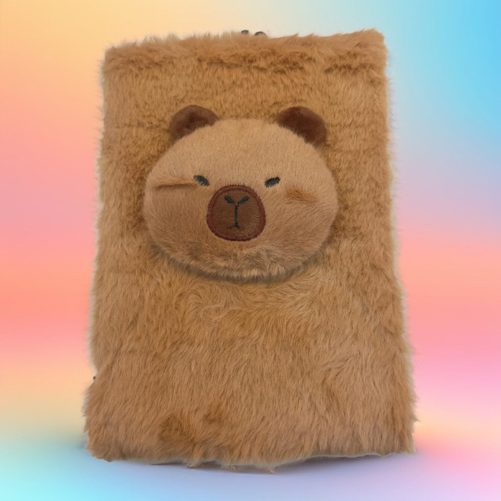 Cuaderno con personajes y peluche