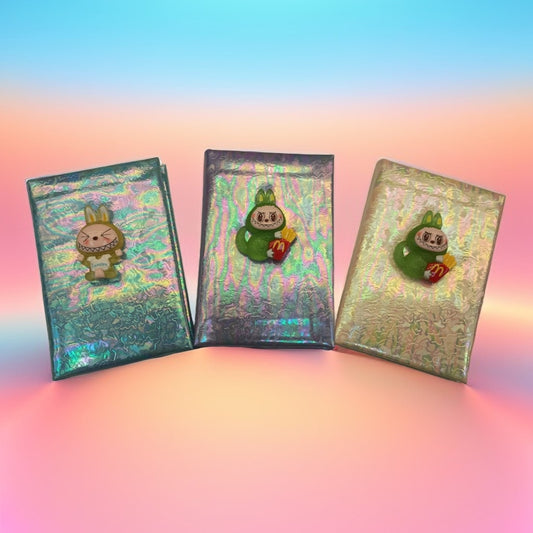 Cadernito con personajes labubu arcoiris capibara peluche