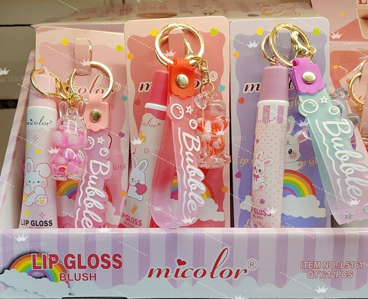 lip gloss and teddy bear keychain